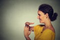 Side profile portrait, young, happy, smiling woman showing time out gesture Royalty Free Stock Photo