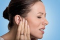 Side profile sick young female having ear pain Royalty Free Stock Photo