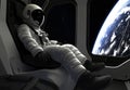 Side profile of a space astronaut sitting inside a rocket. image Royalty Free Stock Photo