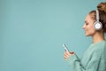 Side-ptofile closeup photo of beautiful young woman wearing stylish casual outfit isolated over colorful background wall Royalty Free Stock Photo