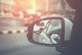 Side rear-view in left mirror on a car. vintage tone Royalty Free Stock Photo