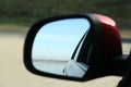 Side rear view mirror of modern car outdoors Royalty Free Stock Photo