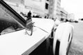 Side rear-view mirror at old vintage retro car. Black and white Royalty Free Stock Photo