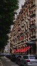 Side shot facade of the Plaza Athenee, a luxurious hotel in Paris, France