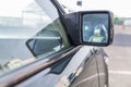Side square mirror on the car. Close-up Royalty Free Stock Photo