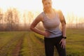 Side stitch - woman runner side cramps.