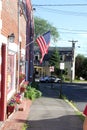 Side street with American Flag in Beverly, Massatuchets Royalty Free Stock Photo