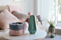 Side table with beautiful interior elements in living room