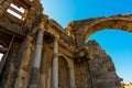 SIDE, TURKEY: The central arched gate of Side, or Vespasian's Gate, is a landmark of the Old City. Royalty Free Stock Photo