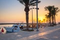 People at the harbor area of Side town at sunset, Turkey