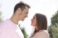 Side view of affectionate young couple looking at each other in park Royalty Free Stock Photo