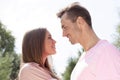 Side view of affectionate young couple looking at each other in park Royalty Free Stock Photo