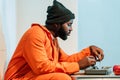 side view of african american prisoner eating Royalty Free Stock Photo