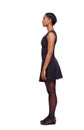 Side view of an African-American woman in a brown dress Royalty Free Stock Photo