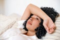 upset african american woman lying on bed and feel loneliness Royalty Free Stock Photo