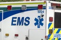 Side view of an Alberta Health Services, emergency medical services or EMS ambulance