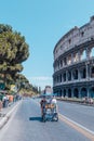 Side view of the Ancient Roman Colosseum, Rome, Italy. Colosseum and tourists in summer day for poster, calendar, post Royalty Free Stock Photo