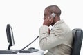 Side view of an angry businessman making a phone call Royalty Free Stock Photo