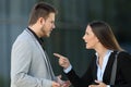 Couple of executives arguing on the street Royalty Free Stock Photo