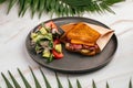 Side view on pastrami sandwich with salad Royalty Free Stock Photo
