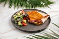 Side view on pastrami sandwich with salad Royalty Free Stock Photo