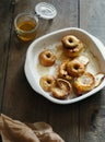 Side view apples topped nuts honey cinnamon baking dish table Royalty Free Stock Photo