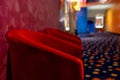 Side view area of in front gate of the movie theater with red chair. Concept of happy time for entertainment to relax on holiday Royalty Free Stock Photo