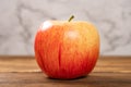 artificial apple on a wood table Royalty Free Stock Photo