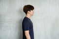 Side view Asia young man on gray background - Casual young man....