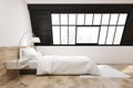 Side view of an attic bedroom with a carpet, light Royalty Free Stock Photo