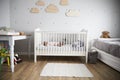 Side View Of Baby Girl Sleeping In Nursery Cot Royalty Free Stock Photo