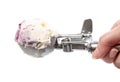 side view of ball of ice cream in disher scoop Royalty Free Stock Photo