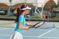 Beautiful and competitive woman smiling before starting the match Royalty Free Stock Photo