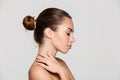 Side view beauty portrait of a beautiful half naked woman Royalty Free Stock Photo