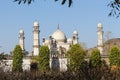 Side view of the Bibi Ka Maqbara tomb against a clear blue sky in Aurangabad, Maharashtra, India