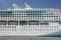 Side view of big cruise liner ship in blue water Royalty Free Stock Photo