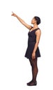 Side view of a black African-American woman in a brown dress poi Royalty Free Stock Photo