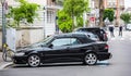 Side view of black luxury vintage Saab 93e cabrio car