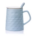 Side view of blue ceramic mug with lid Royalty Free Stock Photo