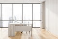 Side view on bright office room interior with panoramic window Royalty Free Stock Photo