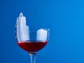 Side view of a broken glass with red wine Royalty Free Stock Photo