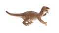 Side view brown plastic dinosaur toy on white background Royalty Free Stock Photo