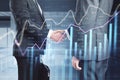 Side view of business men shaking hands with abstract glowing business chart with index and growth on blurry background. Finance, Royalty Free Stock Photo