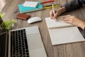 Side view of business woman typing laptop including  with blurred background and selective focus Royalty Free Stock Photo