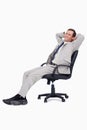 Side view of businessman leaning back in his chair Royalty Free Stock Photo