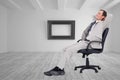 Side view of businessman leaning back in his chair Royalty Free Stock Photo