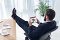 side view of businessman using tablet at workplace