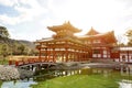 Side view of Byodoin Japanese Buddhist temple with bridge Royalty Free Stock Photo