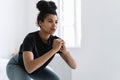 African american girl making squat and breathing exercise Royalty Free Stock Photo