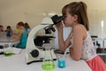 Elementary school girl in chemistry class Royalty Free Stock Photo